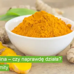 Kurkumina w proszku w miseczce, obok korzeni. Czy kurkumina wlasciwosci to tylko mity?